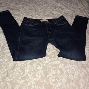 Mid Rise Dark Blue Skinny Jeans